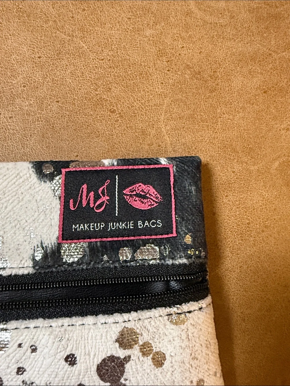 Makeup Junkie Black & White Cowhide Zip Pouch with Tassel